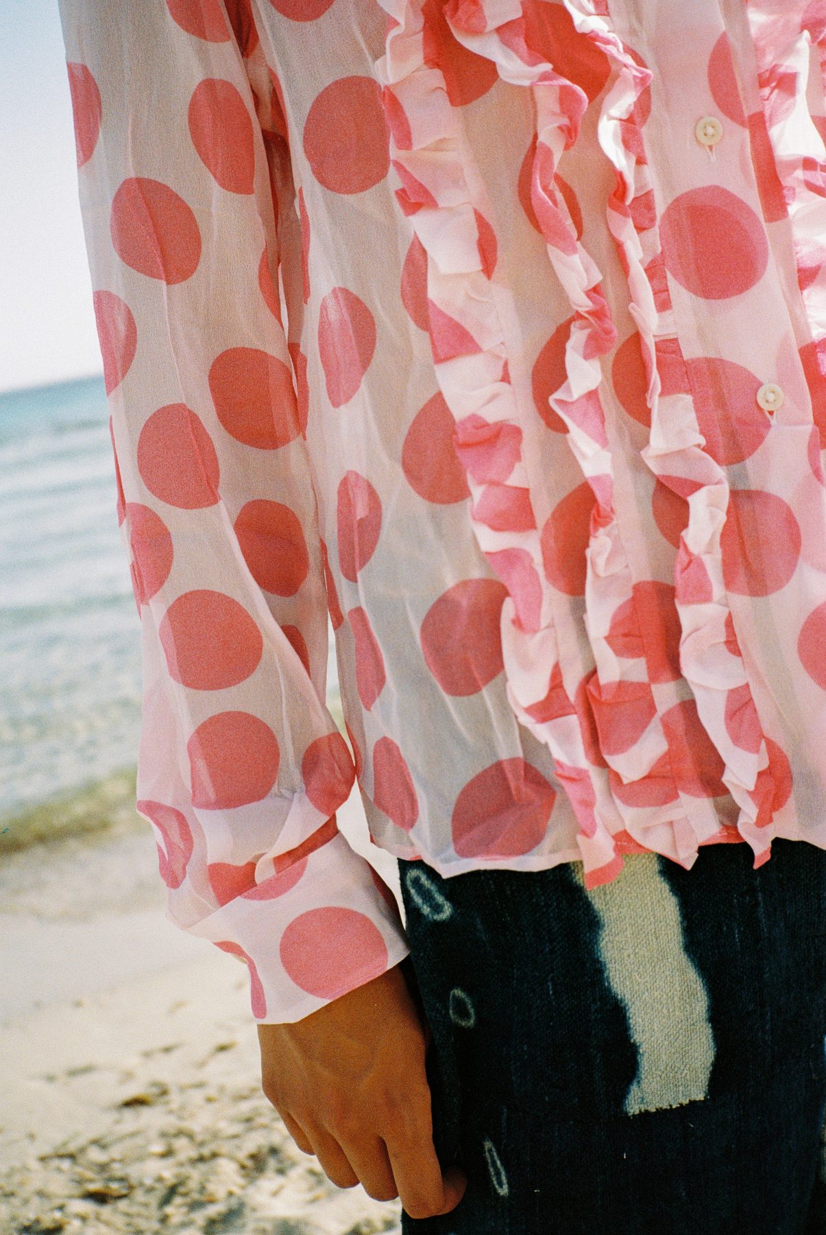 Scan 20 — polka ruffle shirt, sleeve and placket detail