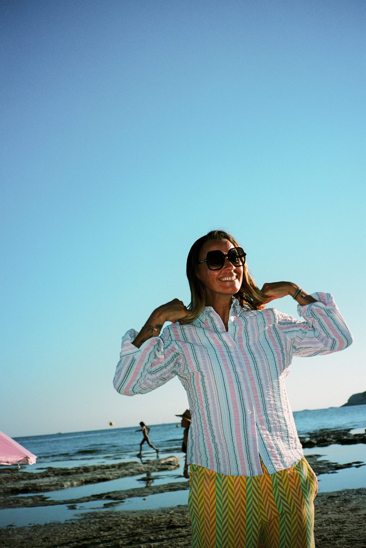 Scan 23 — bubblegum seersucker shirt and lemon nebula herringbones at the shoreline