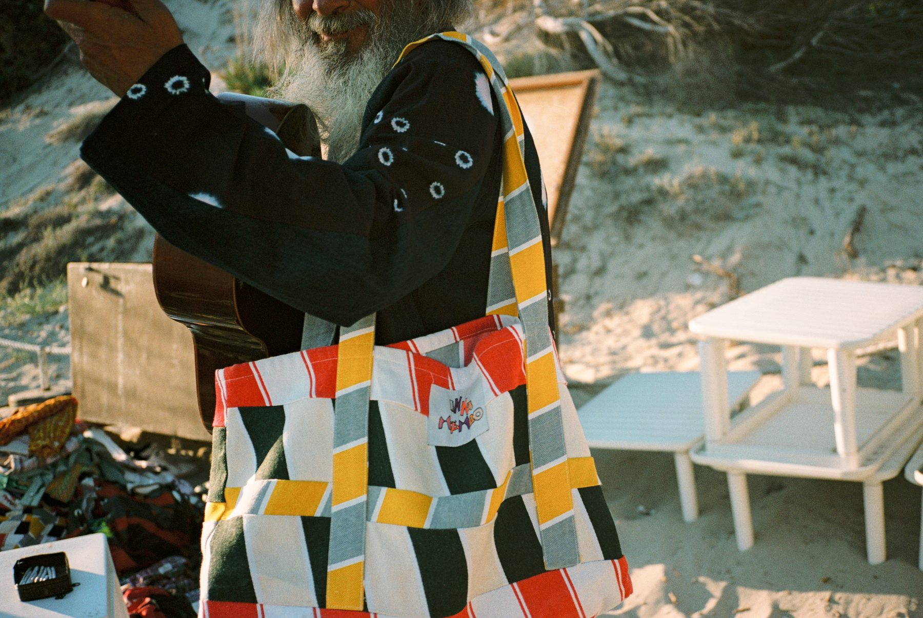 Scan 25 — patchwork tote, woven panels and the Inna Mambo label