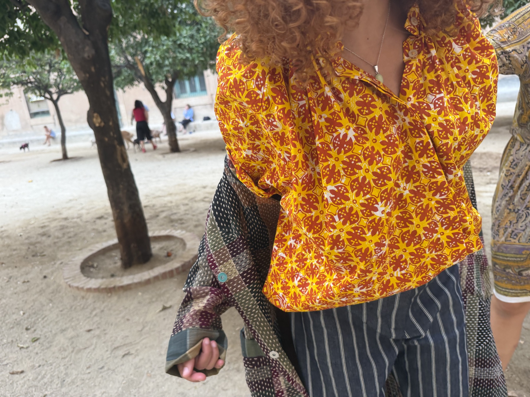Cosmic kaleidoscope smock and kantha grid duster — portrait, Ibiza patio