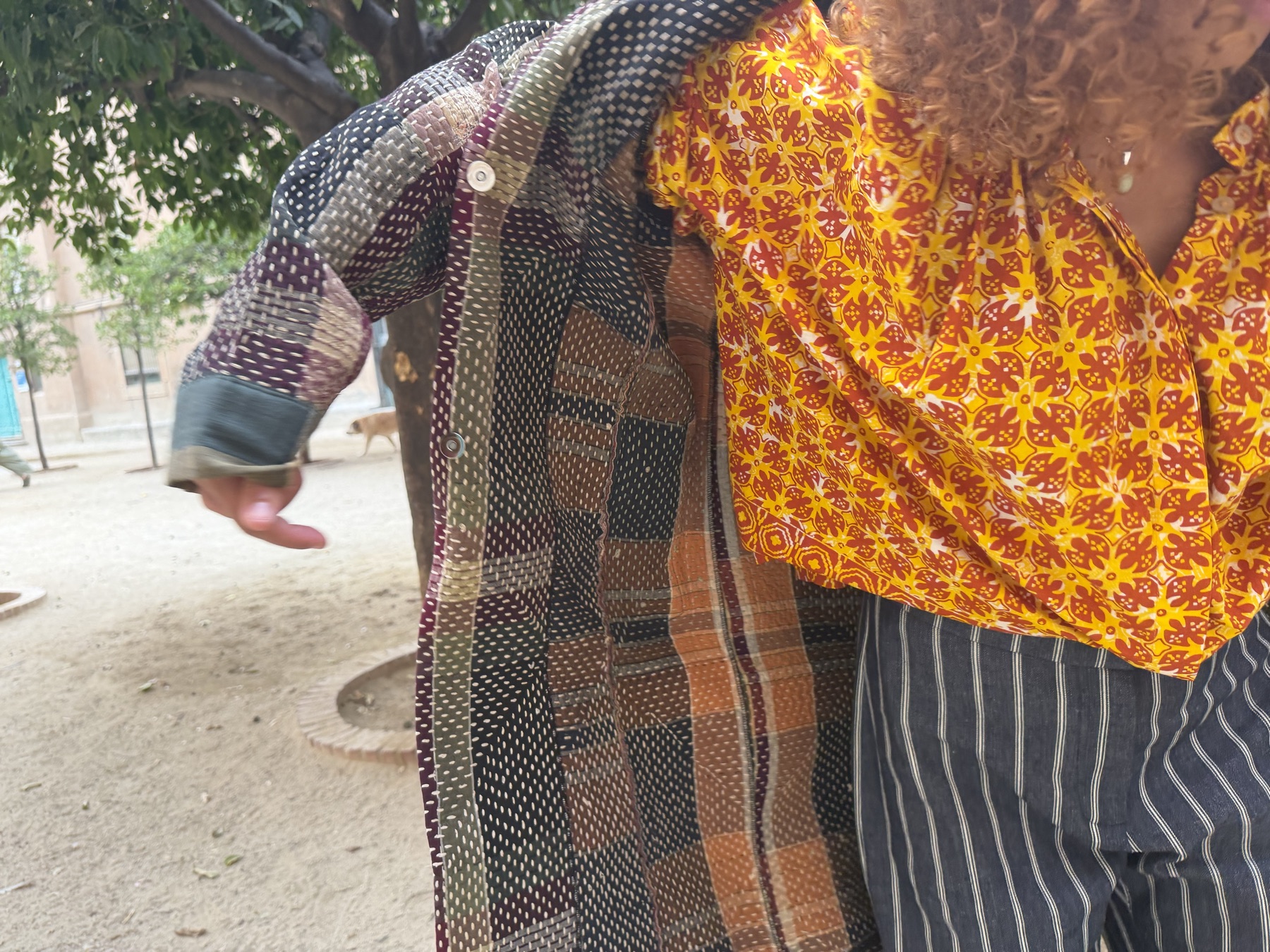 Kantha grid duster, cosmic kaleidoscope smock, and galactic pinstripe trousers — detail